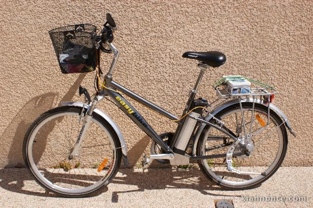 Vélo électique Easybique etat neuf garantie.