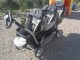 Donne poussette triple peg perego